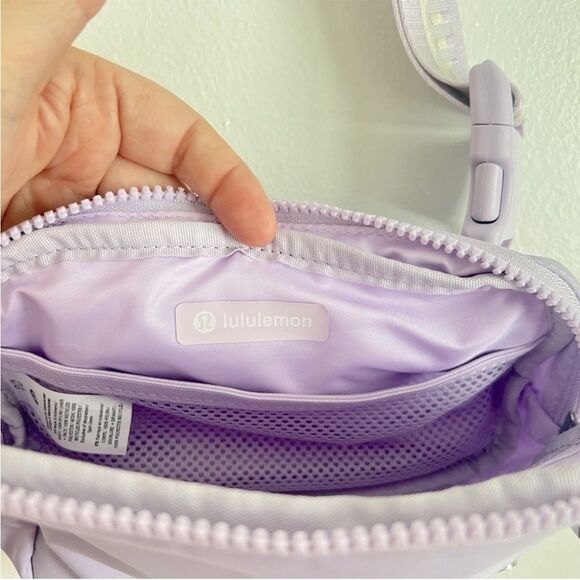 NWOT Lululemon Everywhere Belt Bag 1L
Wordmark- Lilac Ether/White Opal/White - Picture 14 of 16